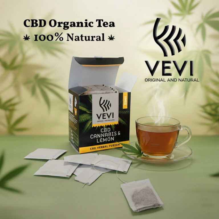 Κουτί με εμβαπτιζόμενα φακελάκια από CBD κάνναβη λεμονιού και δίπλα μια κούπα με τσάι